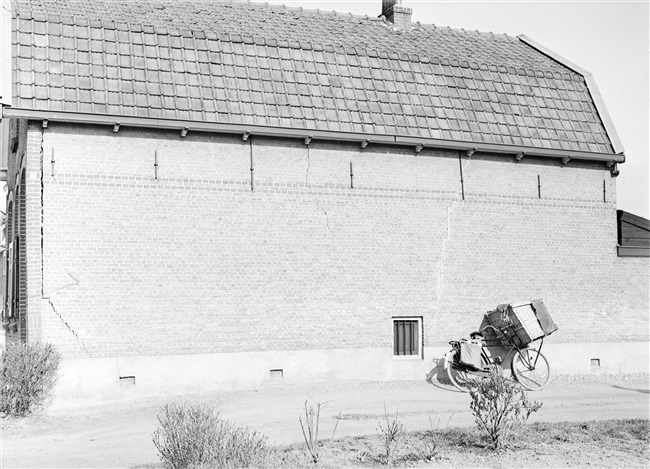 Gevel van een woonhuis met bakkersfiets